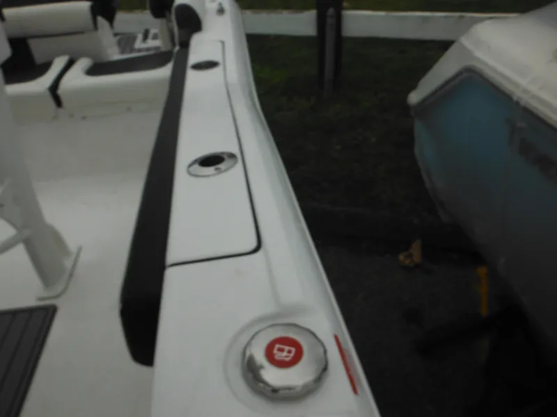 Slide: The Image of 2024 Tidewater 210 LXF boat interior with seating and deck features. - 45