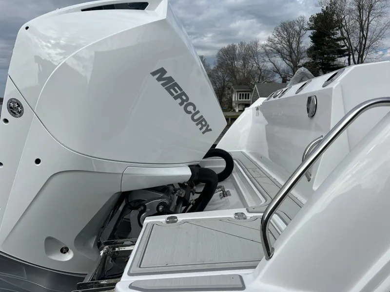 Slide: The Image of 2024 Blackfin 252 CC boat with Mercury outboard engine. - 10