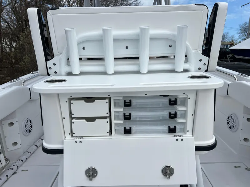 Slide: The Image of 2024 Blackfin 252 CC fishing boat tackle storage and rod holders. - 16