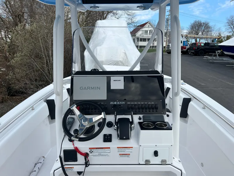 Slide: The Image of 2024 Blackfin 252 CC boat console with Garmin navigation system. - 21
