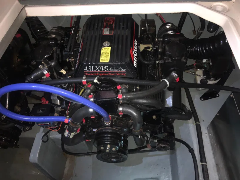 Slide: The Image of Engine compartment of a 1989 Sea Ray 280 Sundancer with MerCruiser 4.3L V6 engine. - 42