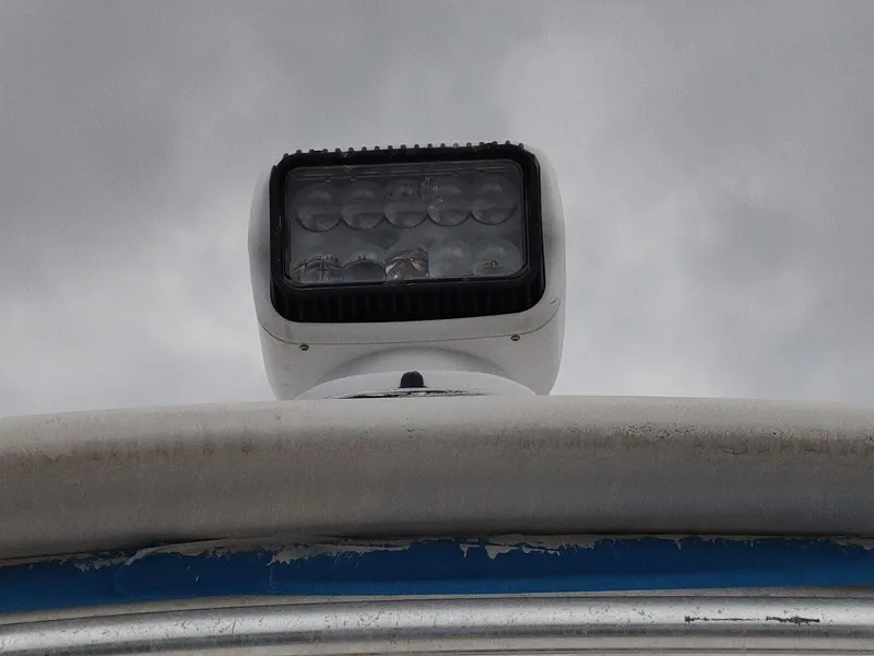 Slide: The Image of Rooftop light on 1988 Trojan F32 Sedan against cloudy sky. - 12