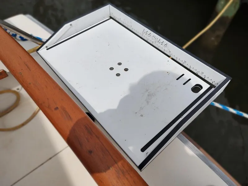 Slide: The Image of Cutting board on a Trojan F32 Sedan boat, 1988 model, with ruler markings. - 33