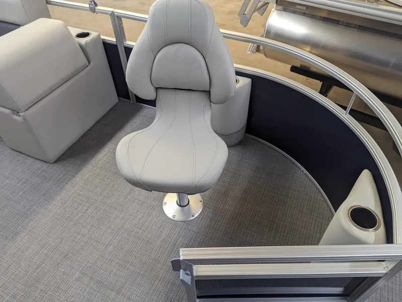 Slide: The Image of 2024 SunChaser Vista 16 Fish boat interior with a swivel chair and cup holders. - 4