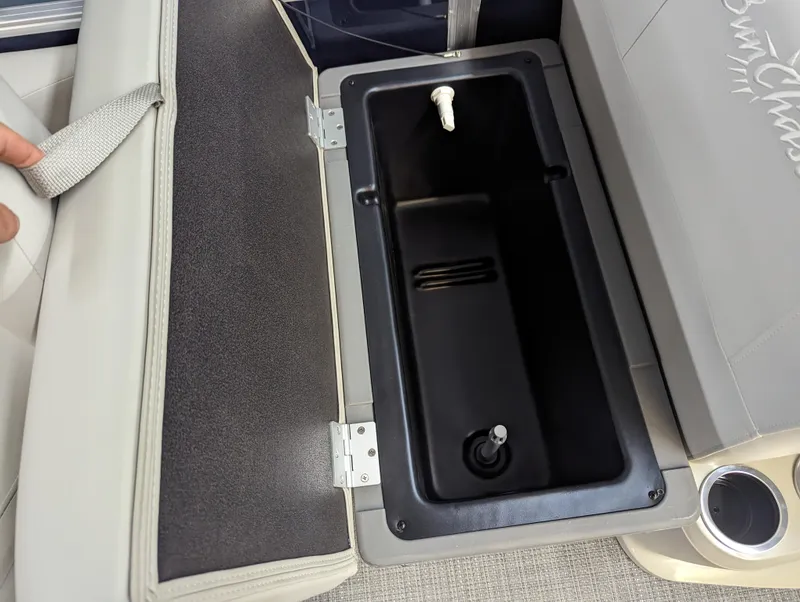 Slide: The Image of 2024 SunChaser Vista 16 Fish boat with open storage compartment. - 7