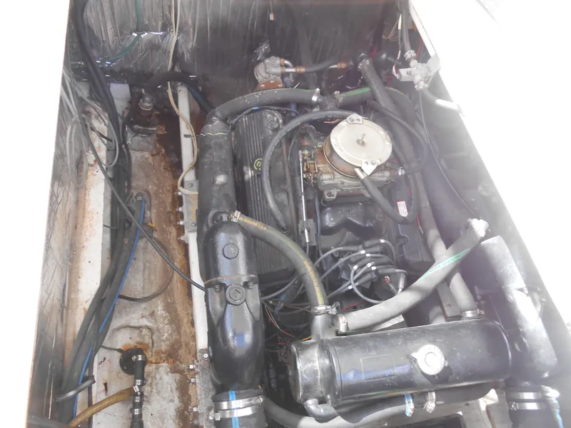 Slide: The Image of Engine compartment of a 1988 Cruisers Yachts 4280 Express Bridge. - 25