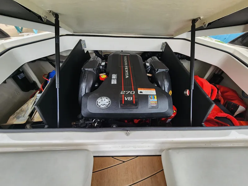 Slide: The Image of 2016 Regal 2100 Bowrider engine compartment with Volvo Penta 270 V8 engine. - 12