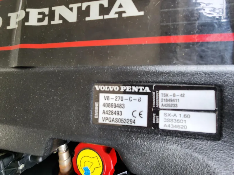 Slide: The Image of Volvo Penta engine label on 2016 Regal 2100 Bowrider boat. - 13