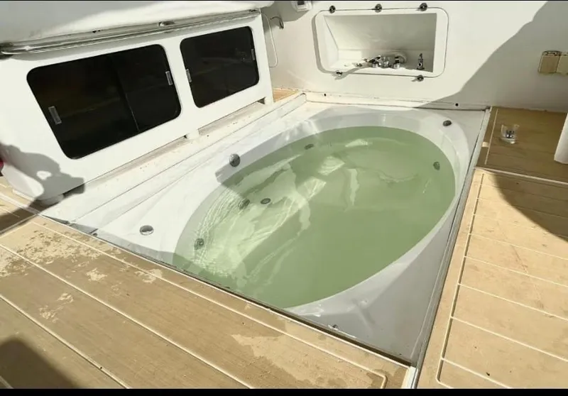 Slide: The Image of Built-in hot tub on the deck of a 1984 Infinity Express boat. - 3