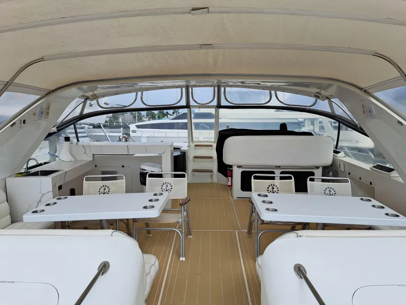 Slide: The Image of Luxurious 1984 Infinity Express yacht interior with seating and tables. - 4