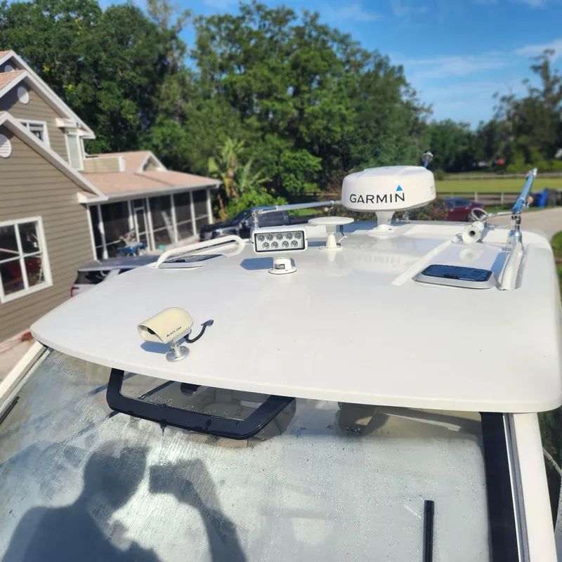 Slide: The Image of 2020 Pursuit OS 325 Offshore boat with Garmin radar and accessories. - 10