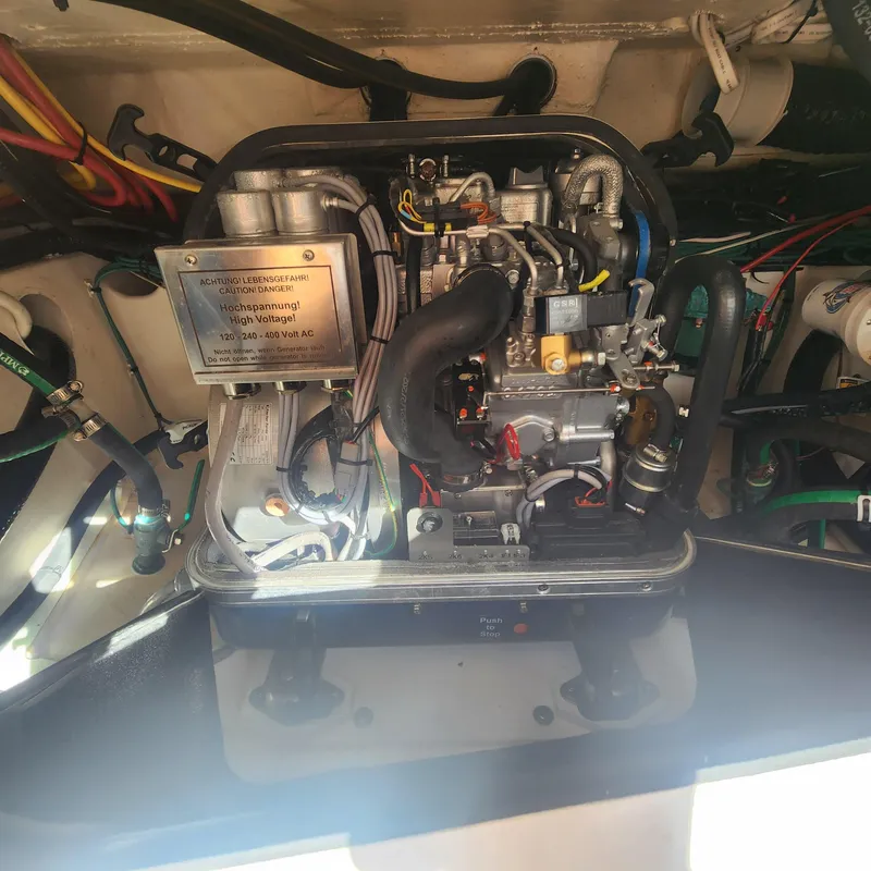 Slide: The Image of Engine compartment of a 2020 Pursuit OS 325 Offshore boat. - 20
