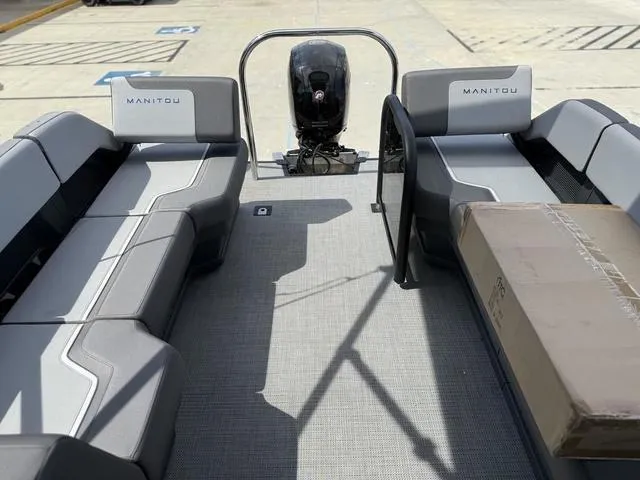 Slide: The Image of 2024 Manitou Cruise 22 Max Switchback V-Toon capacity label: 11 persons or 1551 lbs. - 10