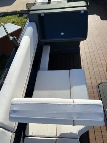 Slide: The Image of 2024 Manitou Explore 26 Switchback Single Engine V-Toon interior seating. - 15