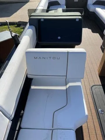 Slide: The Image of 2024 Manitou Explore 26 Switchback Single Engine V-Toon interior seating. - 16