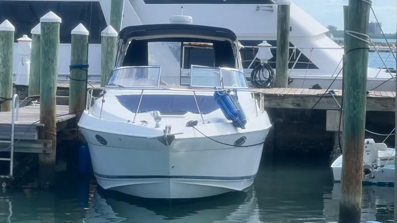 The Image of 2003 Regal Commodore 3260 boat docked at marina, front view. - 0