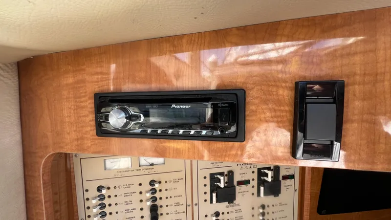 Slide: The Image of 2003 Regal Commodore 3260 dashboard with Pioneer stereo and control panel. - 27