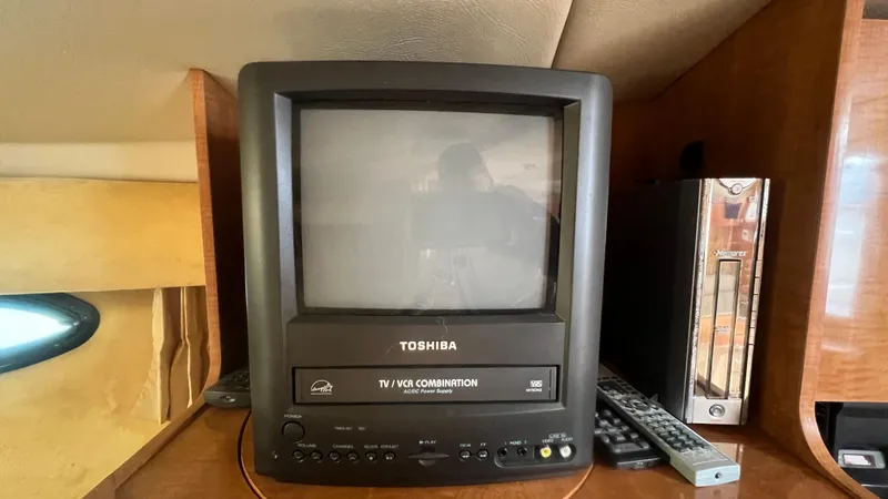 Slide: The Image of Vintage Toshiba TV/VCR combo on a Regal Commodore 3260 yacht, 2003 model. - 41