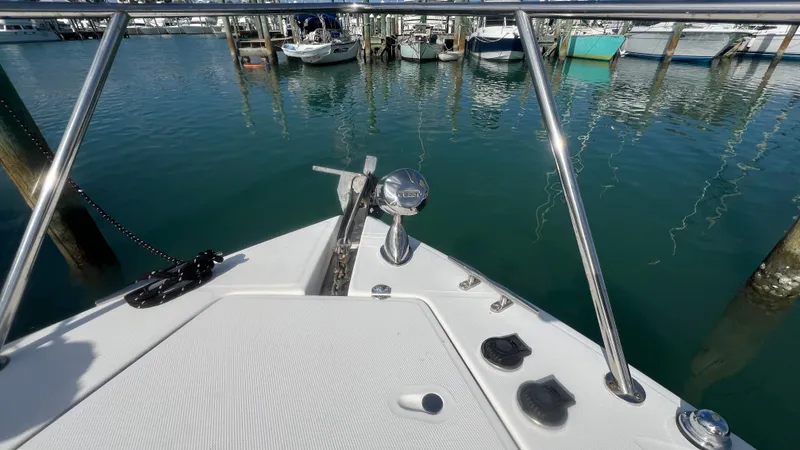 Slide: The Image of Bow of 2003 Regal Commodore 3260 yacht docked at marina. - 7