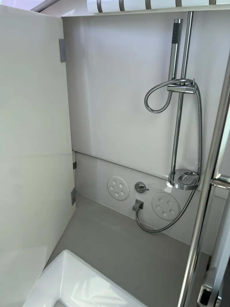 Slide: The Image of Modern shower area in 2022 Axopar 37 Sun Top boat. - 24