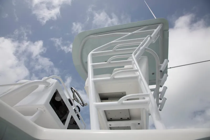 Slide: The Image of 2022 World Cat 400CC-X boat with dual helm stations and spacious deck. - 11
