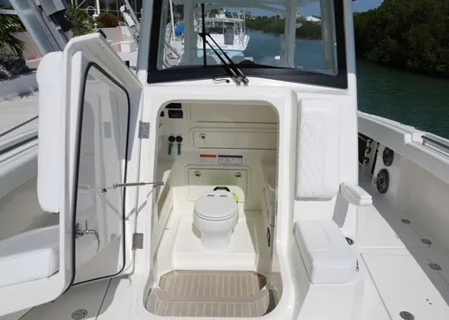 Slide: The Image of Close-up of storage compartments on a 2022 World Cat 400CC-X boat. - 27