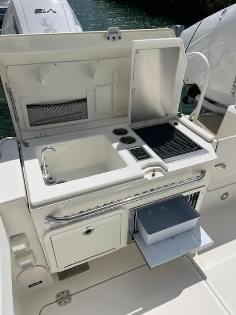 Slide: The Image of Electrical control panel of 2022 World Cat 400CC-X boat. - 29