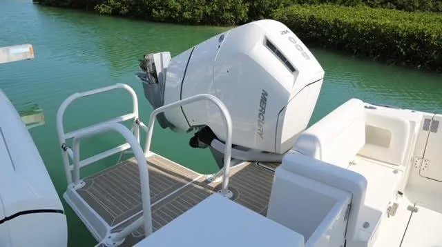 Slide: The Image of 2022 World Cat 400CC-X boat interior with seating and helm station. - 31