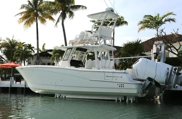 Slide: The Image of 2022 World Cat 400CC-X boat on open water. - 4