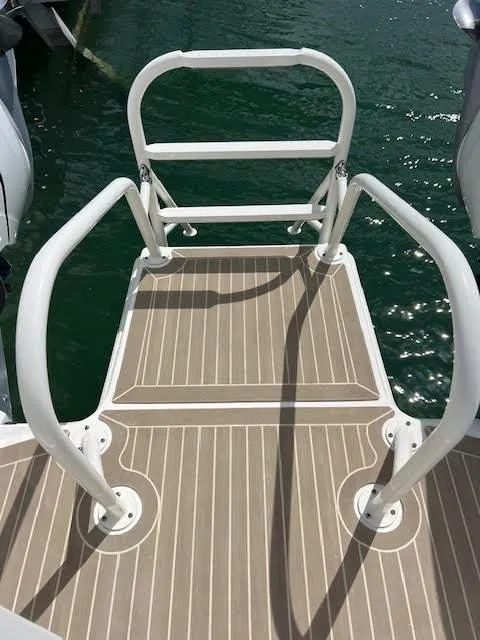 Slide: The Image of 2022 World Cat 400CC-X swim platform with safety rails. - 40