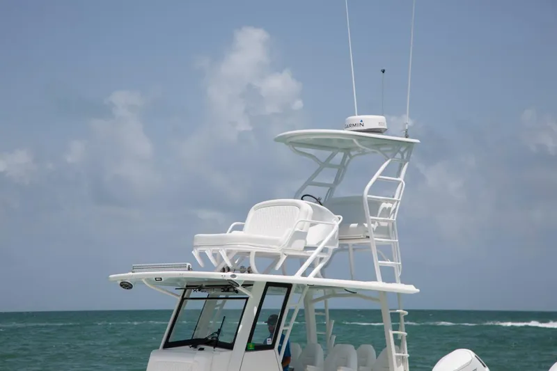 Slide: The Image of 2022 World Cat 400CC-X boat on open water. - 7