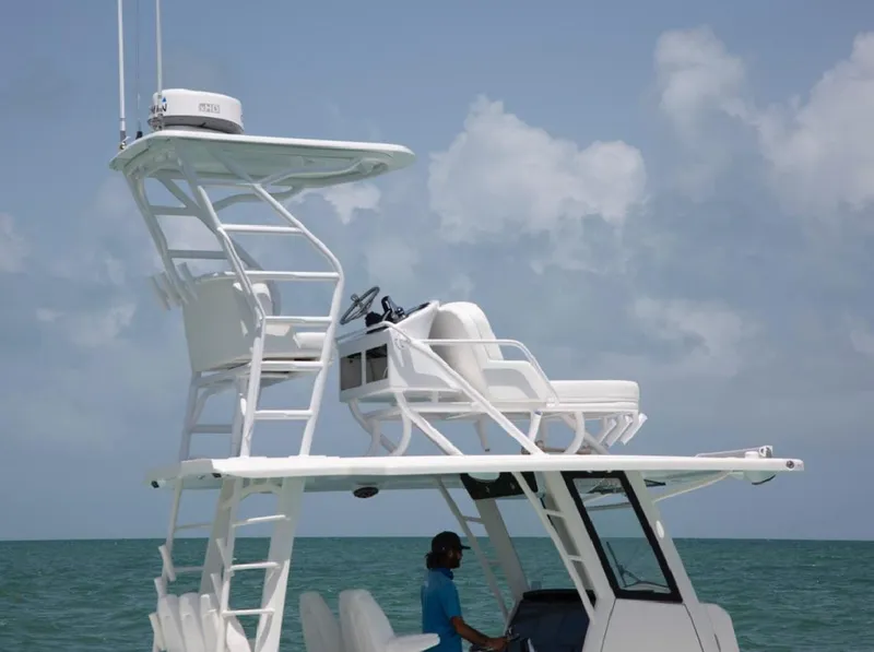 Slide: The Image of 2022 World Cat 400CC-X boat cruising on open water. - 8