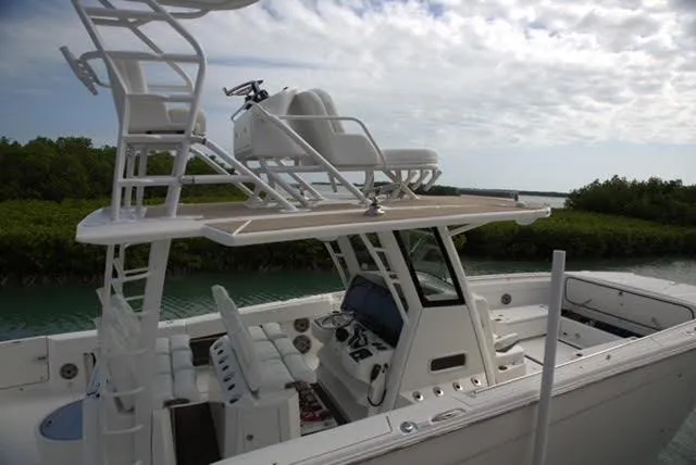 Slide: The Image of 2022 World Cat 400CC-X boat on the ocean with clear sky background - 9