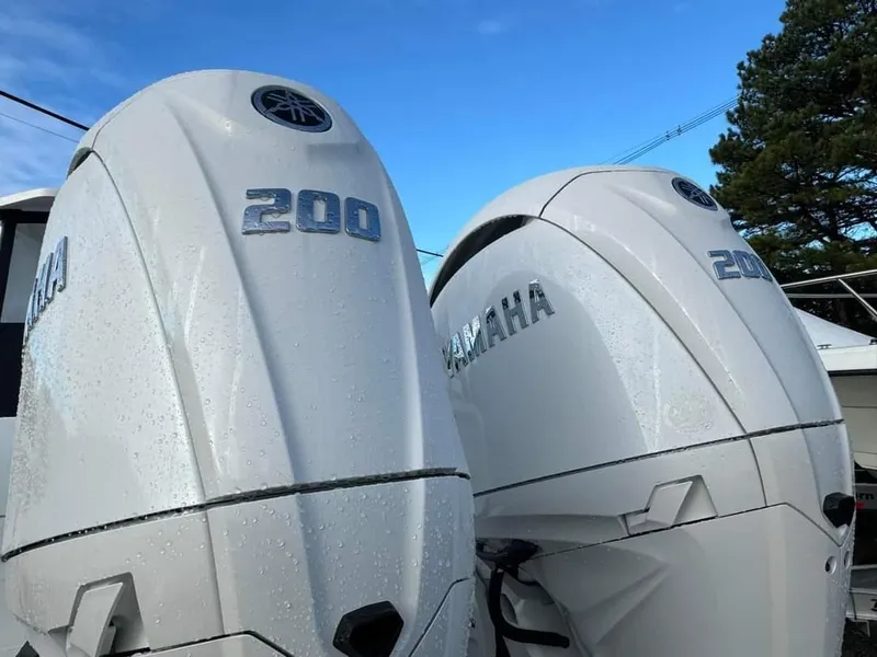 Slide: The Image of Twin Yamaha 200 outboard engines on a 2024 NorthCoast 255 Cabin boat. - 11
