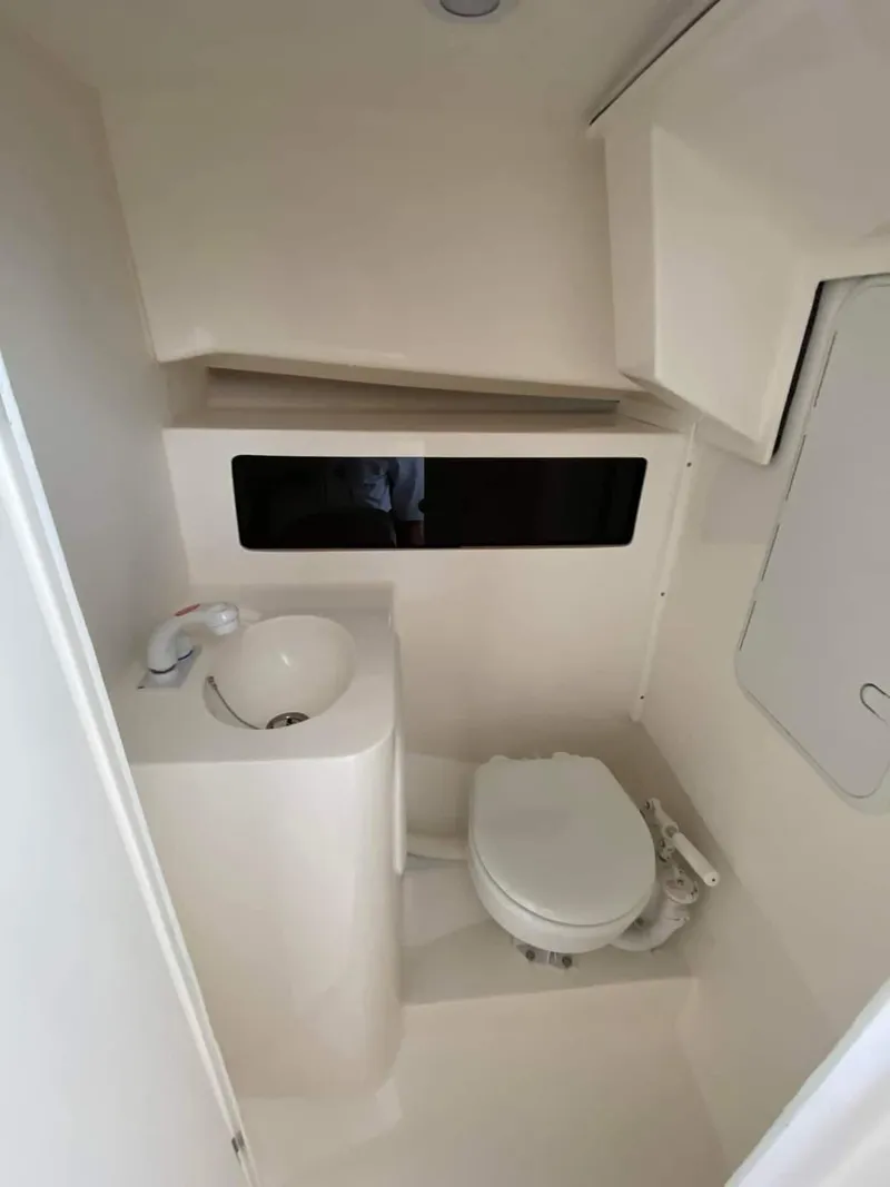 Slide: The Image of 2024 NorthCoast 255 Cabin bathroom with sink and toilet. - 20