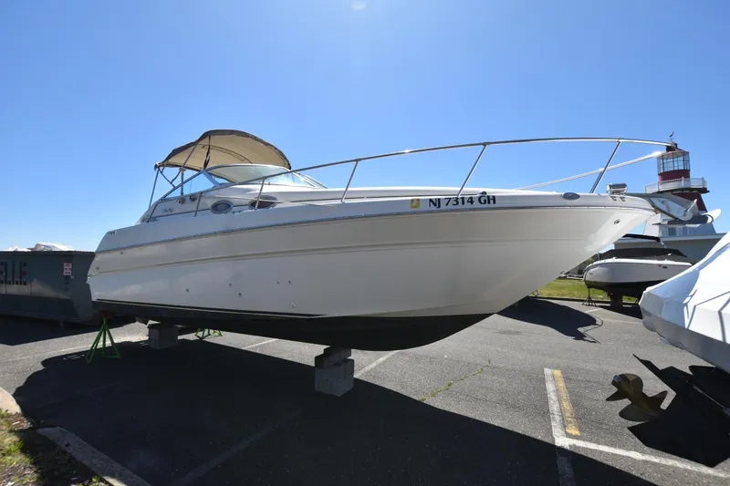 Slide: The Image of 1998 Sea Ray 270 Sundancer boat on dry dock. - 4