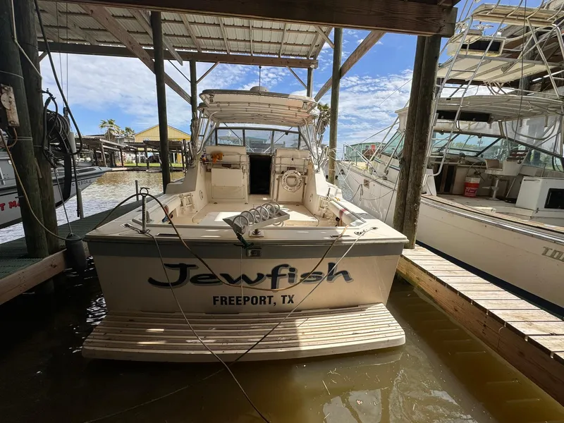 Slide: The Image of 1987 Luhrs Alura boat named Jewfish docked in Freeport, TX. - 8