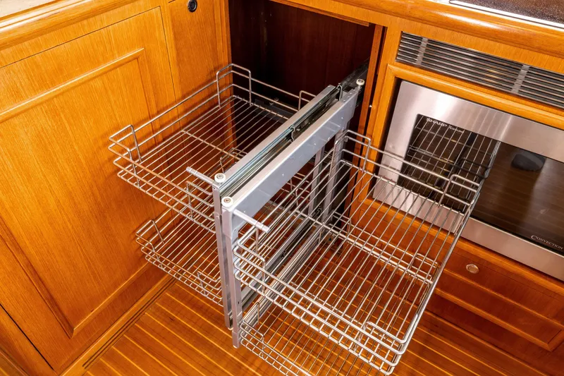 Slide: The Image of Pulled Out Storage Racks - 13