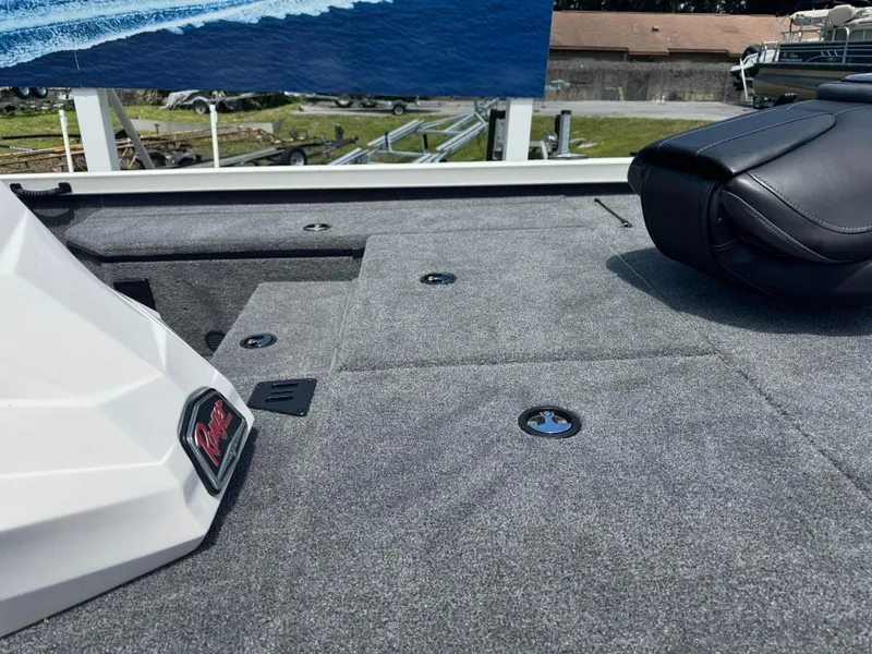 Slide: The Image of 2024 Ranger RT178 boat deck with storage compartments and seating. - 3