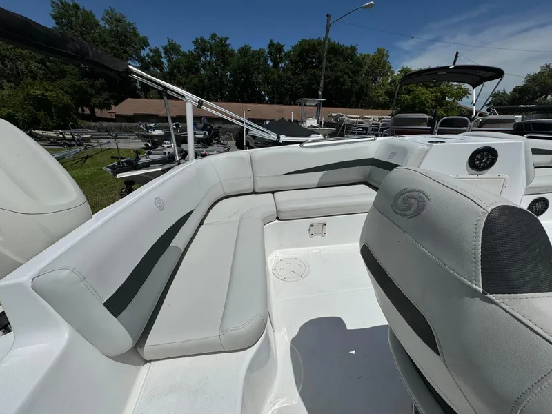 Slide: The Image of 2024 Ranger RT178 boat interior with white and gray seating. - 5