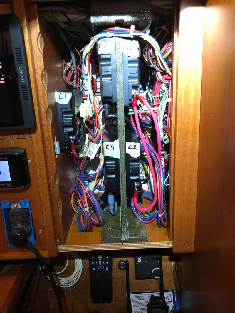 Slide: The Image of Electrical panel with wiring in a 1999 Malo 45 boat. - 38