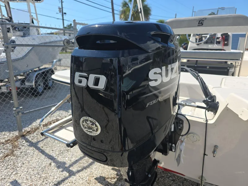Slide: The Image of 2024 Carolina Skiff E16 JVX CC with Suzuki 60 HP outboard motor. - 7