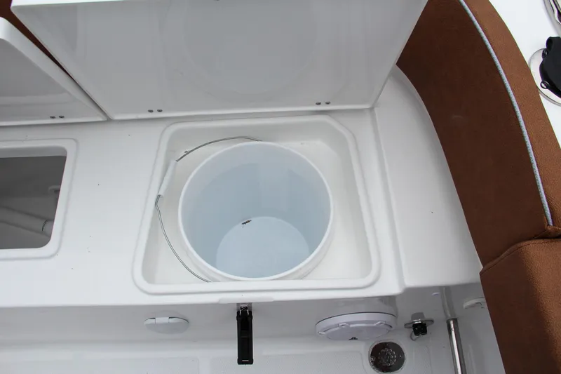 Slide: The Image of Livewell compartment on a 2024 Sea Hunt Ultra 229 boat. - 14