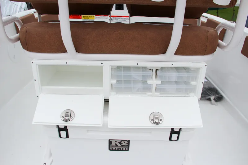 Slide: The Image of 2024 Sea Hunt Ultra 229 boat storage compartments and seating. - 19