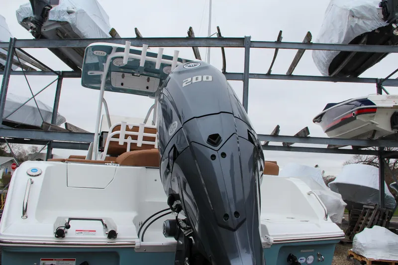 Slide: The Image of 2024 Sea Hunt Ultra 229 boat with 200 HP outboard motor. - 3