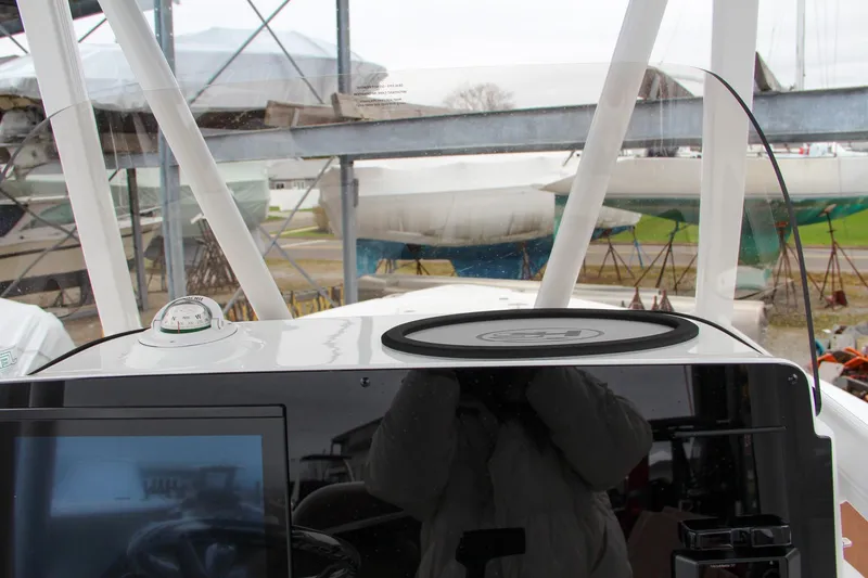 Slide: The Image of 2024 Sea Hunt Ultra 229 boat dashboard with navigation equipment. - 34