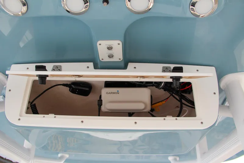 Slide: The Image of 2024 Sea Hunt Ultra 229 console storage with Garmin electronics. - 36