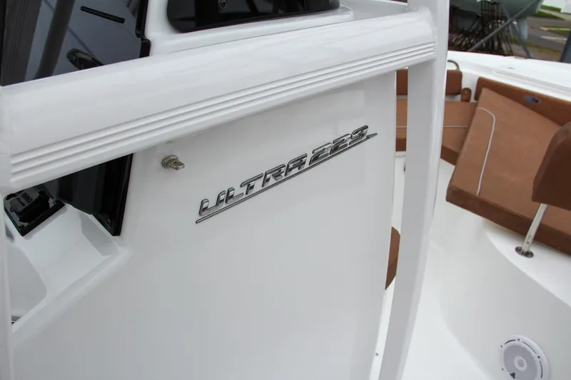 Slide: The Image of 2024 Sea Hunt Ultra 229 boat interior with model nameplate. - 39