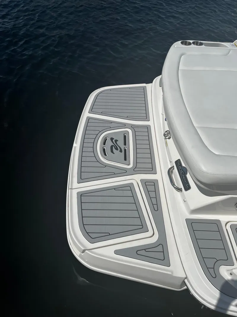 Slide: The Image of 2014 Sea Ray 240 Sundeck swim platform with gray non-slip decking. - 3