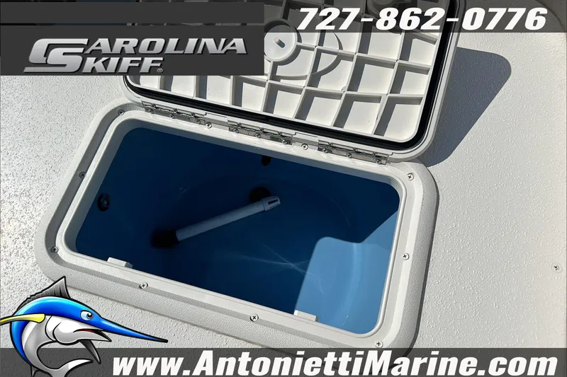Slide: The Image of 2024 Carolina Skiff E21 DLX CC livewell, open lid, Antonietti Marine branding. - 13